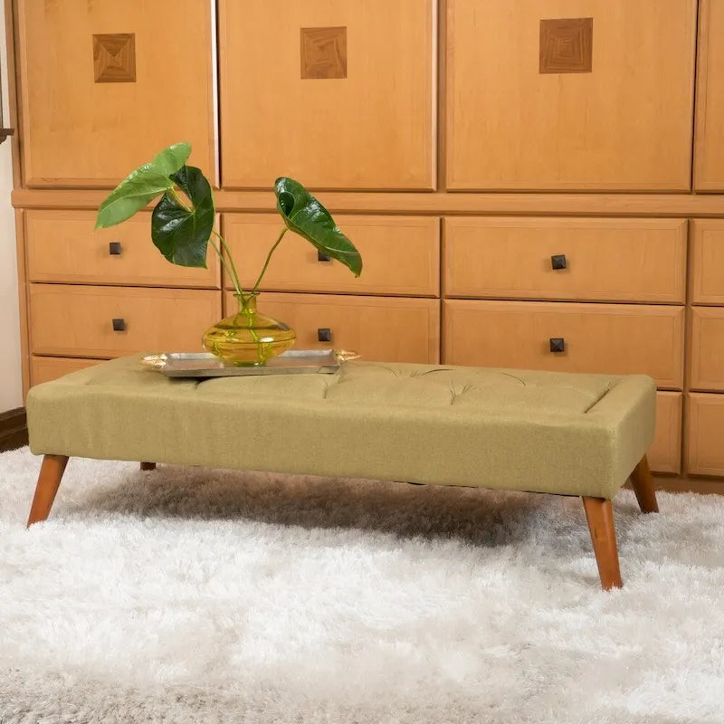 Pouffe en tissu capitonné