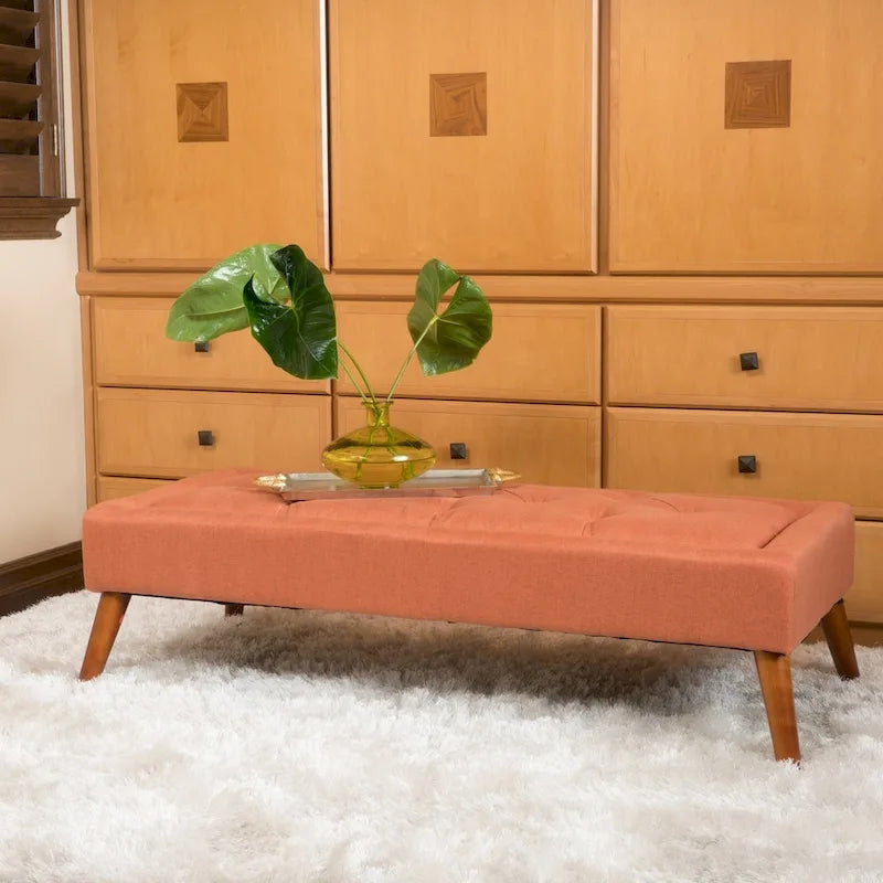 Pouffe en tissu capitonné