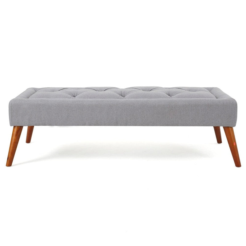 Pouffe en tissu capitonné
