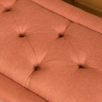 Pouffe en tissu capitonné