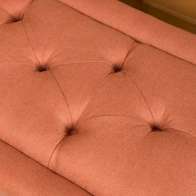 Pouffe en tissu capitonné