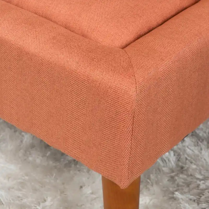 Pouffe en tissu capitonné