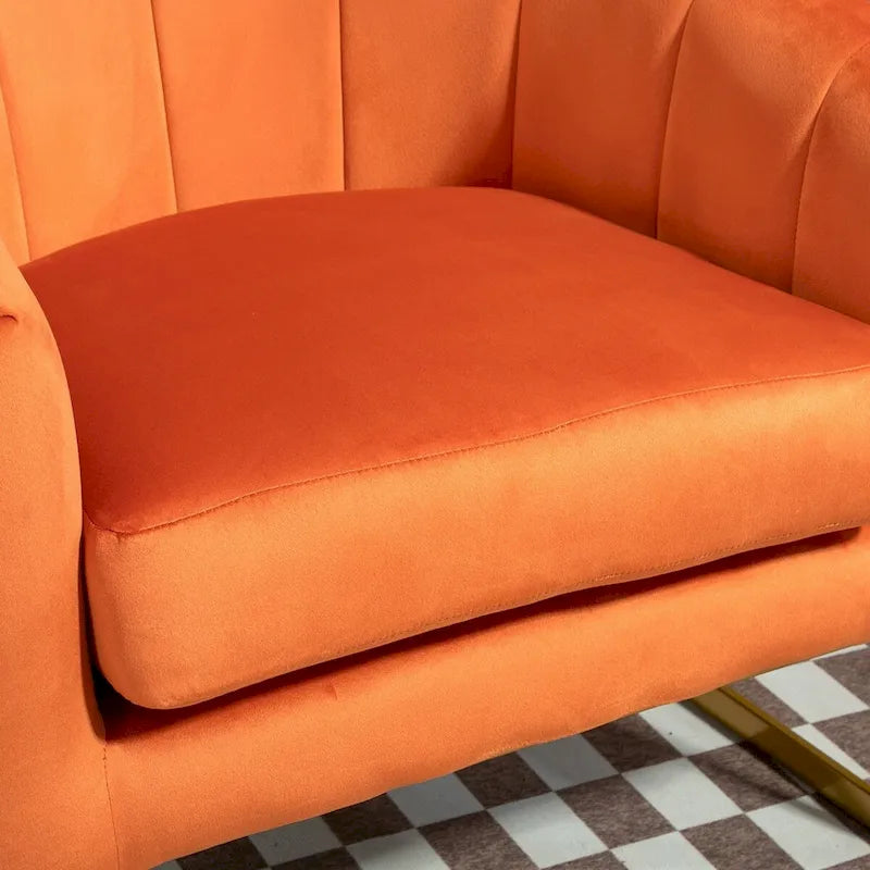 Fauteuil moderne en velours avec accents dorés