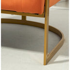 Fauteuil moderne en velours avec accents dorés